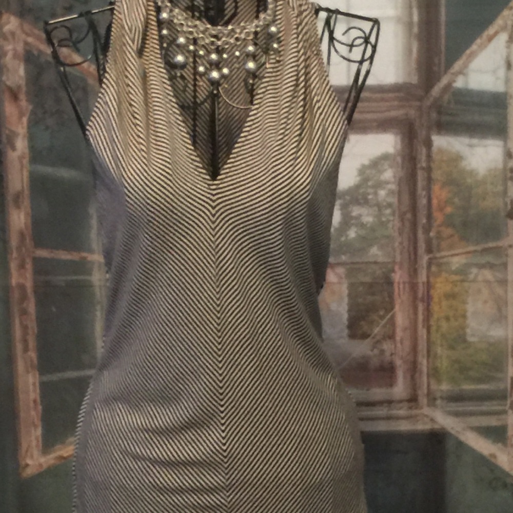 White House/ Black Market b&w sleeveless blouse.